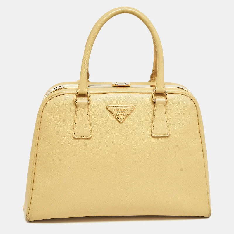 Convertible satchel that can be worn as a crossbody or shoulder bagPrada Yellow Saffiano Lux Leather Pyramid Frame Satchel