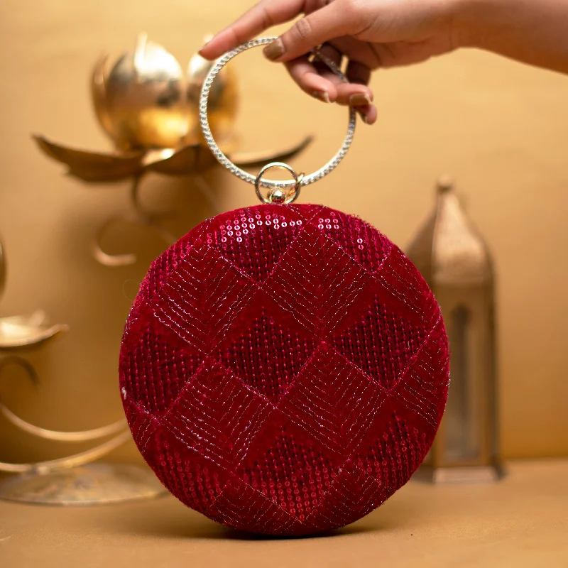 Embroidered silk clutch with a traditional motif for a cultural touchRed and Silver Embroidery Round Clutch