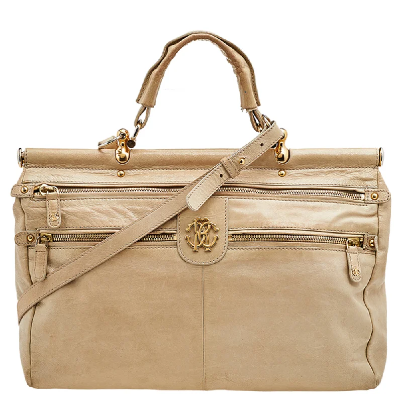 Vintage-inspired satchel with a brass buckle and leather tasselsRoberto Cavalli  Leather Multiple Pocket Top Handle Bag