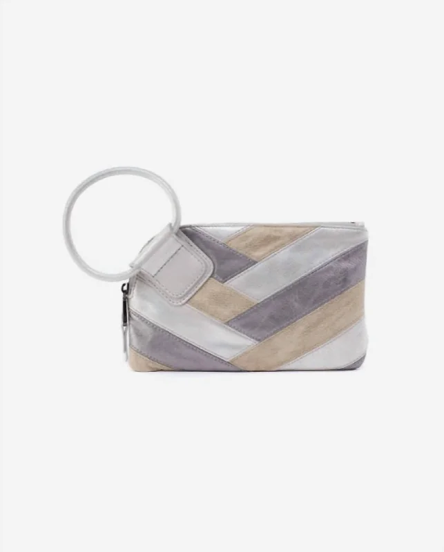 Embroidered silk clutch with a traditional motif for a cultural touchSable Hobo Wristlet In Silver