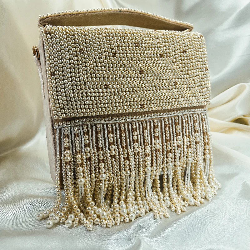 Mother - of - pearl clutch with a delicate sheenSAHARA Sling Bag