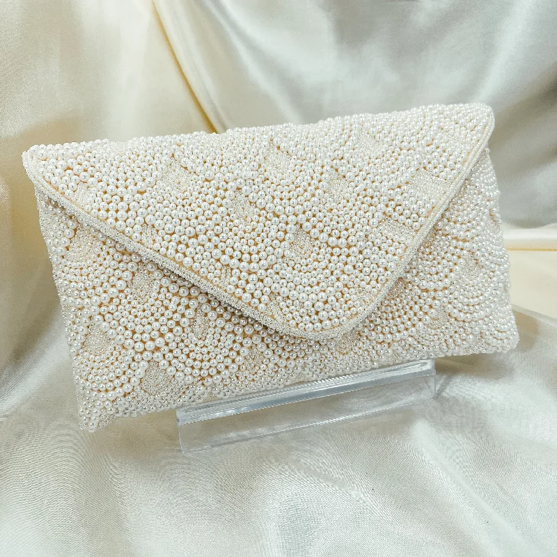 Women's satin clutch with a beaded flower accent for a glamorous eveningSERENA Clutch