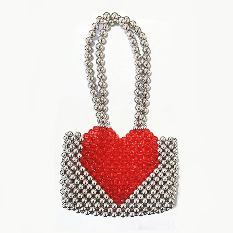 Women's laser - cut leather handbags with geometric designsTop Quality Girls Heart Pattern Pearl Handbag Ladies Acrylic Pearl Beaded Shoulder Clutch Bag