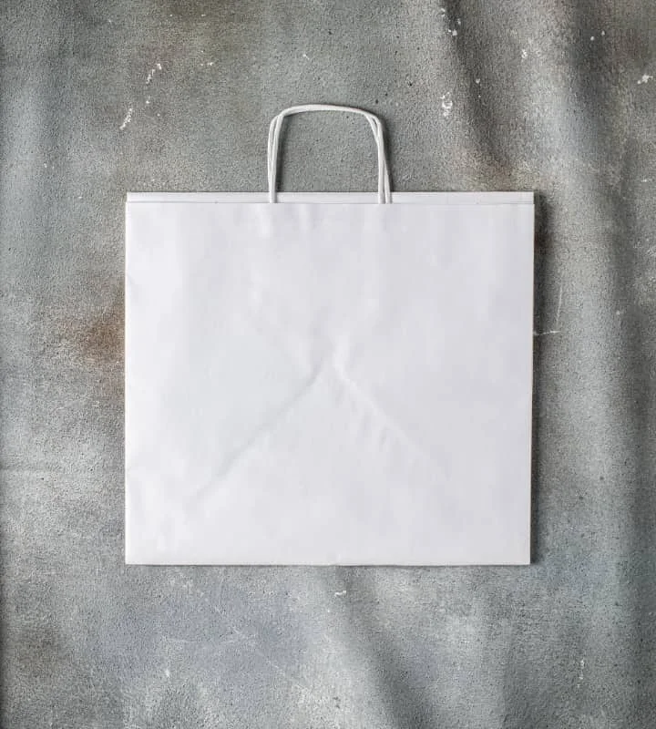 Convertible handle bag that can be worn as a shoulder bag with an adjustable strapTwisted Handle Kraft Catering Bag - White 360x330x320mm