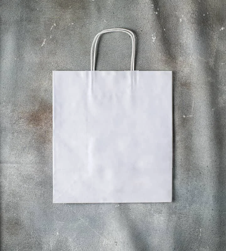 Convertible handle bag that can be worn as a shoulder bag with an adjustable strapTwisted Handle Kraft Paper Bag - White 305x170x340mm