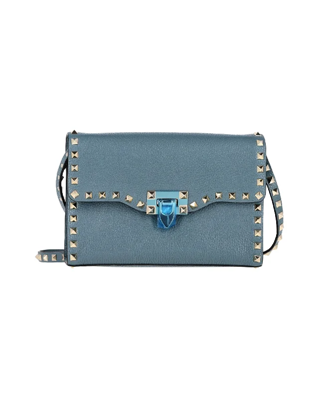 Satchel with a detachable strap for easy customizationValentino Rockstud Crossbody Bag in Blue Leather