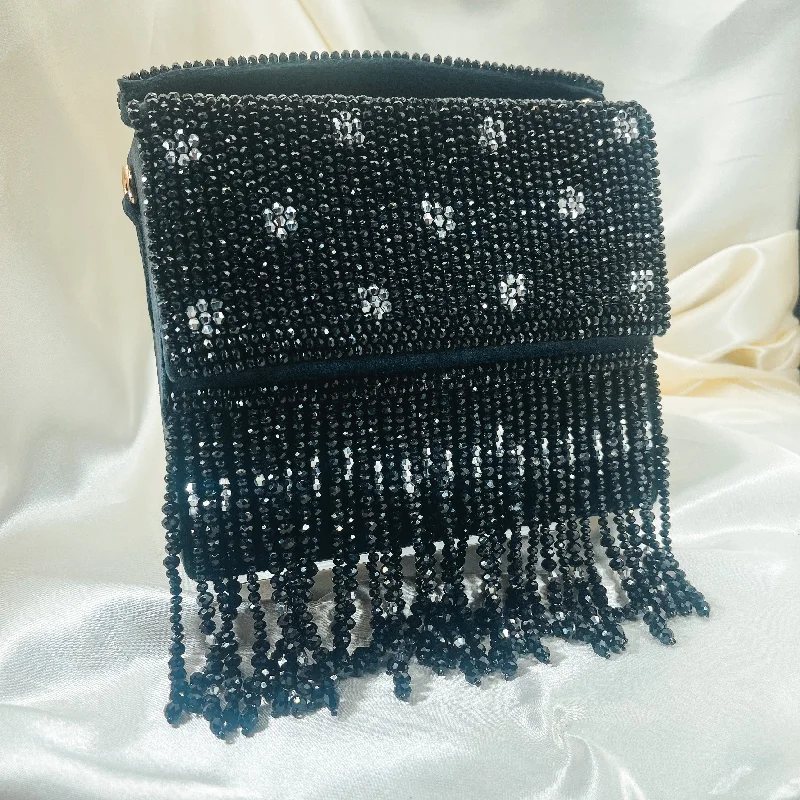 Miniature evening bag with a fold - over clasp for a compact optionVOGUE Sling Bag